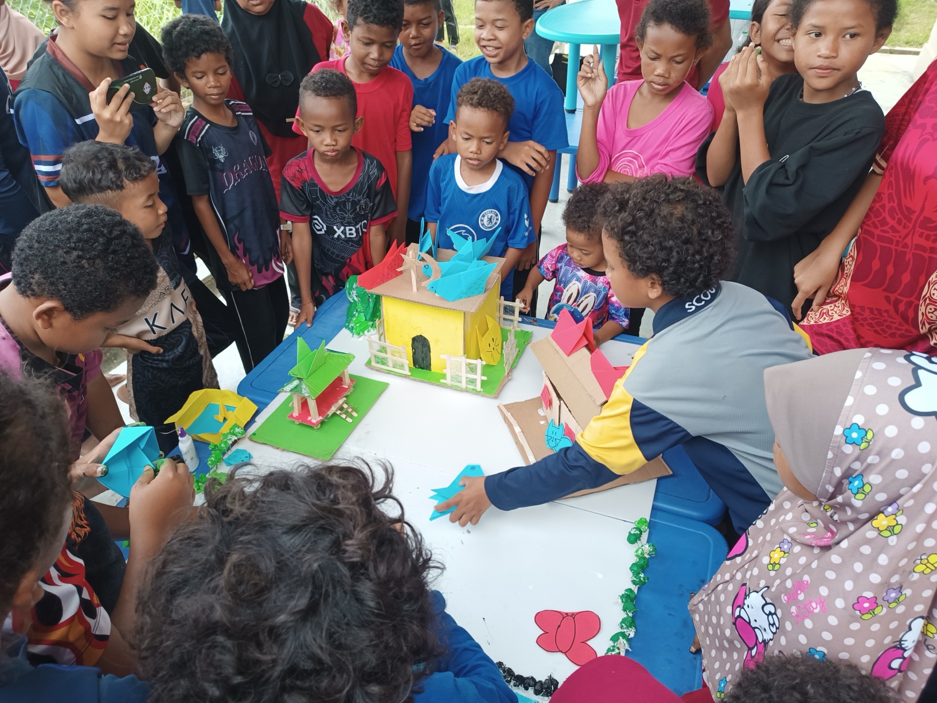 Interior of a Saora+ learning centre equipped with books, educational materials, and colourful wall displays